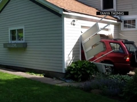 Man Fulfills Bucket List Crashing Through Garage
