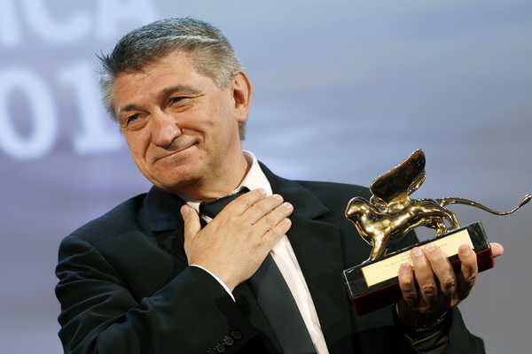 Sokurov, director of "Faust", receives the Golden Lion award during the closing ceremony of the 68th Venice Film Festival