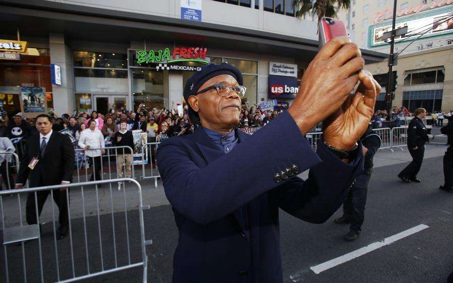 Cast member Samuel L. Jackson takes a selfie at the premiere of "Captain America: The Winter Soldier" in Hollywood