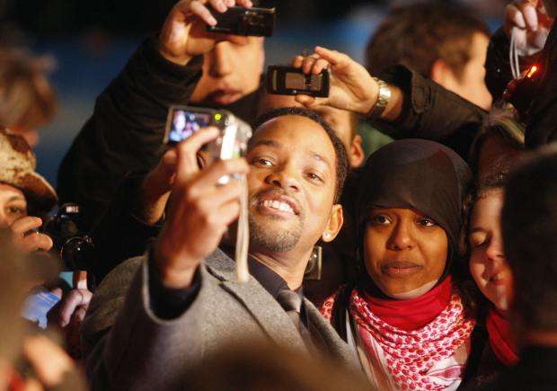 US actor Will Smith takes pictures of hi