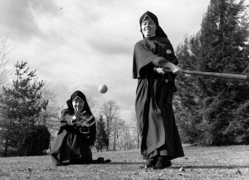 14th May 1976: Two nuns playing baseball. (Photo by De Vries/BIPs/Getty Images)