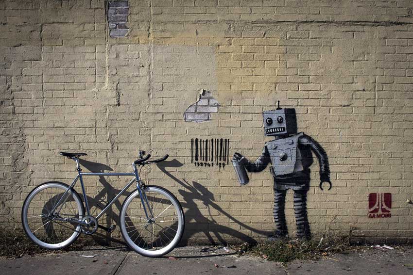 this-robot-graffiti-artist-tagging-a-wall-with-a-barcode-what-else-was-part-of-bankys-well-publicized-and-2013