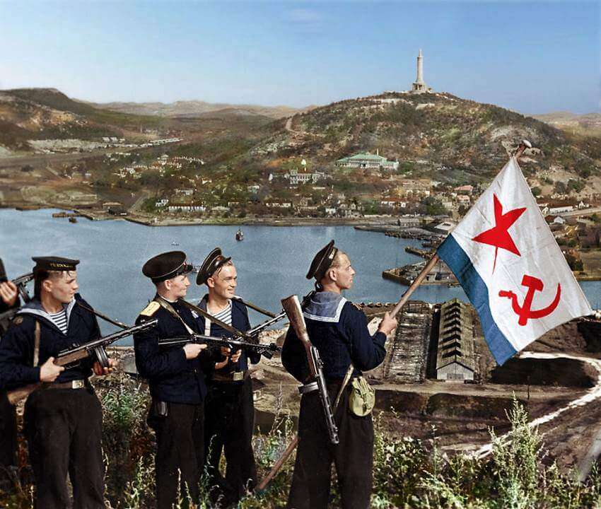 Soviet Sailors Raise The Ussr’s Naval Ensign Over Port-Artur, 1945