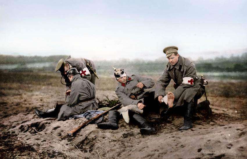 Red Cross Personnel Attending To Wounded Soldiers On A Russian Battlefield, WWI
