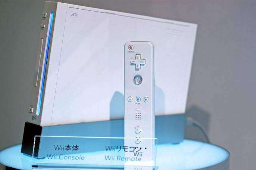 Nintendo unvelied its latest handheld game device, Wii, at a press event at Makuhari Messe near Tokyo, Japan on Thursday 14 September, 2006. Pictured here are the device's console and oe of its remote controls. Photographer: Robert Gilhooly/Bloomberg News