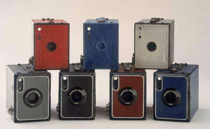 UNITED KINGDOM - OCTOBER 25: George Eastman marketed the original Brownie to be an inexpensive camera for the mass market. The camera, which was designed by Frank Brownell, was literally a cardboard box with a wooden end, yet it took perfectly good photographs. Eastman named the camera after characters popularised by the Canadian children's author, Palmer Cox. This camera, which was produced in a range of colours, was the first to be designed and built at the new Kodak camera factory at Harrow, Middlesex. Prior to this, all Kodak cameras were imported fromthe United States and Canada. (Photo by SSPL/Getty Images)