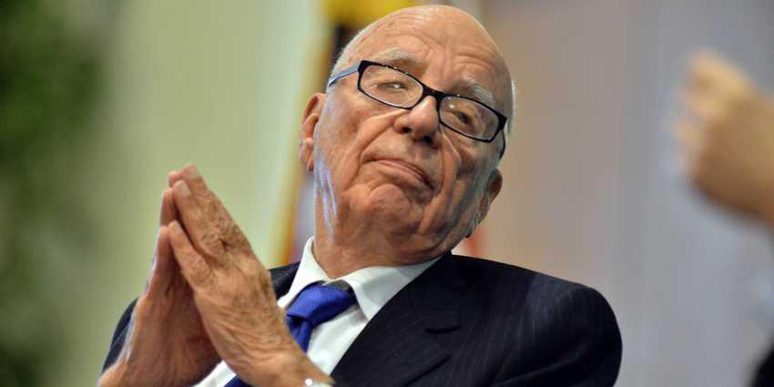 News Corporation CEO Rupert Murdoch listens during a forum on The Economics and Politics of Immigration where Murdoch and New York Mayor Michael Bloomberg spoke to a business organization In Boston, Tuesday, Aug. 14, 2012. (AP Photo/Josh Reynolds)