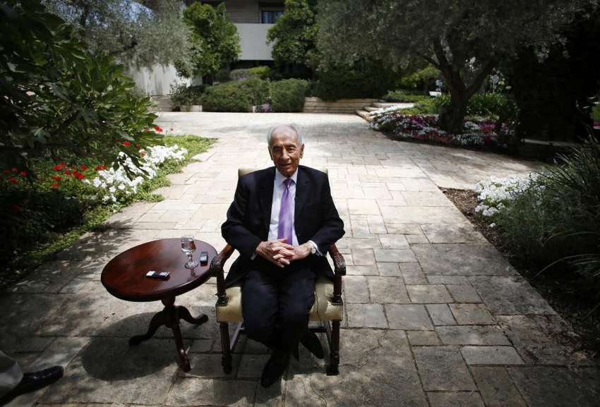 Israel's President Shimon Peres speaks during an interview with Reuters at his residence in Jerusalem